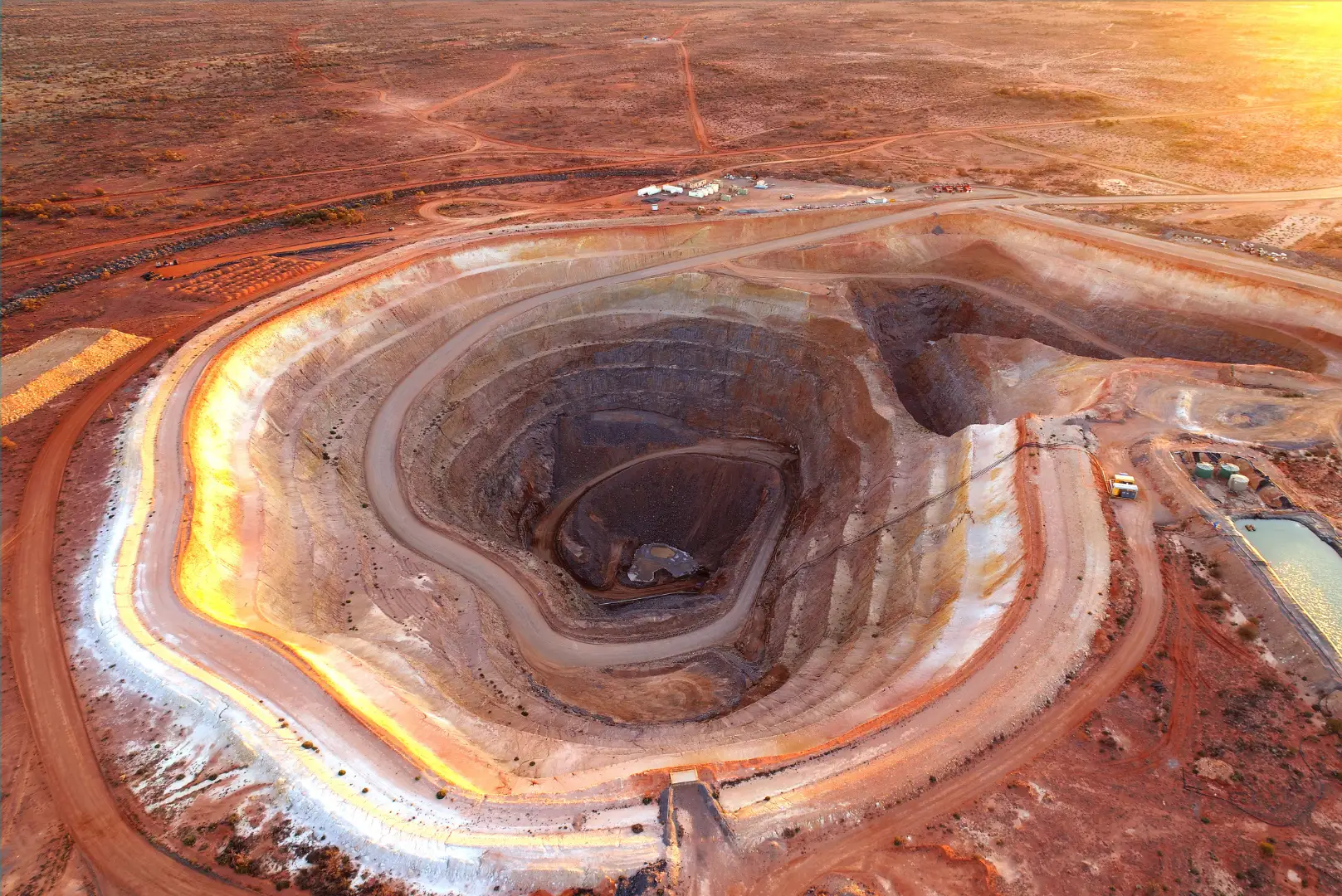 An aerial view of an open-pit mine.